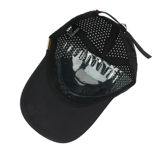 Black breathable baseball cap with laser-cut vents and gold Sport metal side logo