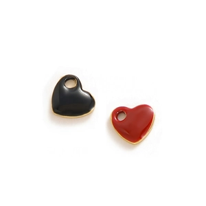 Detail of red and black heart-shaped enamel pendants with gold-plated metal edges