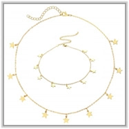 Detail of gold floral star chain necklace and bracelet set with lobster clasps