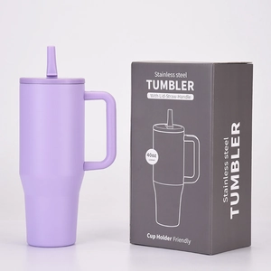 Detailed view of a purple 40oz stainless steel tumbler with straw and packaging box