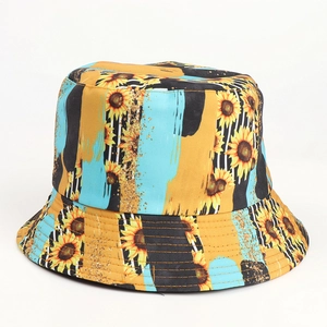 Detail of sunflower printed bucket hat featuring vibrant floral patterns and fine stitching