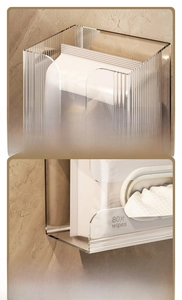 Macro shot of transparent acrylic wall-mounted tissue box with vertical striped texture