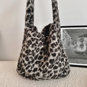 Detailed view of the soft leopard print faux fur texture on this large hobo tote bag