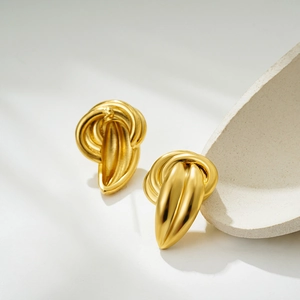 Elegant 18K gold-plated stainless steel knot stud earrings with a stylish folded design
