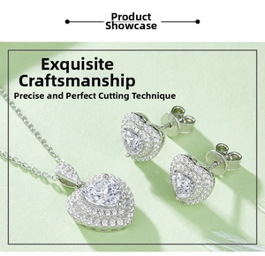 Close-up of S925 sterling silver heart-shaped stud earrings with clear moissanite stone