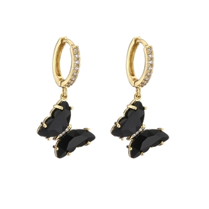 Detail showing gold plated crystal butterfly earrings with black faceted stones