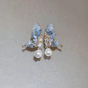 Elegant silver butterfly earrings with blue crystals and a drop white pearl pendant