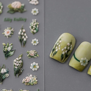 3D Lily of the Valley nail art stickers with white daisies and green leaf designs