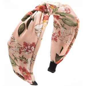 Pink bohemian floral print knotted headband with a wide fabric design and non-slip tips