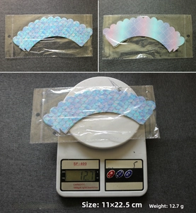 Set of 6 mermaid tail cupcake wrappers with holographic scale patterns for party decor