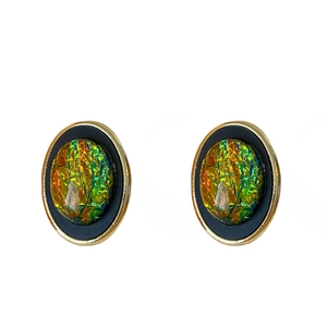 Orecchini vintage ovali dorati con intarsio nero cangiante e perni in argento per donna