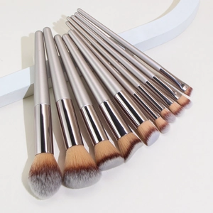 Champagne 10-piece makeup brush set with gradient bristles and silver-grey handles