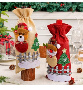 Festive Christmas burlap wine bottle covers with cute bear and snowman decorations