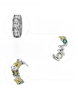 Detail showing 925 sterling silver, cubic zirconia, and enamel craftsmanship for the charm
