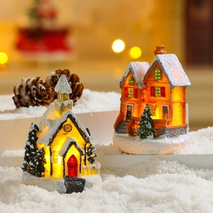 Lighted Christmas miniature houses set for festive desktop decoration and winter display