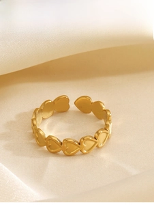 Detail shot of 18K gold plated heart band ring with a minimalist open adjustable design