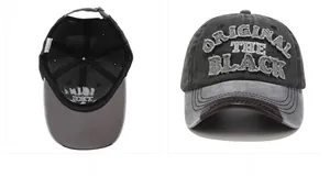 Detail of washed denim baseball cap featuring embroidery patch and brown leather brim trim