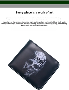 Close-up of black leather skull wallet featuring purple punk design and fine stitching