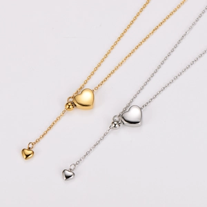 Minimalist tassel heart pendant necklaces in gold and silver metal finishes