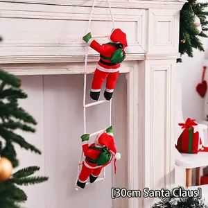 Detail of two 30cm climbing Santas on white rope ladder with festive fireplace backdrop