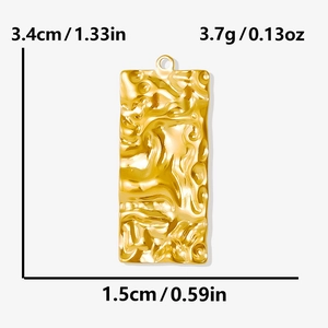 Detailed view of gold rectangle pendant with dimensions 3.4cm x 1.5cm and 3.7g weight