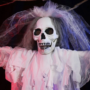Close-up of Halloween hanging ghost bride with dramatic red and blue lighting
