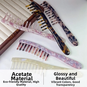 Close-up of premium acetate wide-tooth combs featuring tortoiseshell and floral patterns