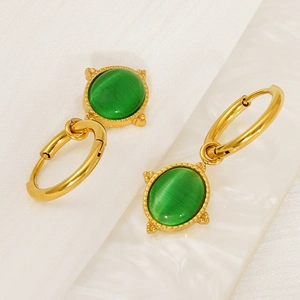 Detail of 18K gold-plated stainless steel earrings with oval green cat eye stone pendants