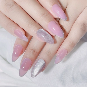 Detail of pink almond press-on nails with silver cat-eye glitter and velvet gradient effect