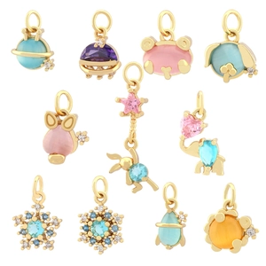 Gold-plated animal and star charms with colorful gemstones for DIY jewelry making
