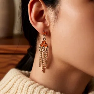 Vintage gold triangle drop earrings with amber gemstones and long crystal tassels