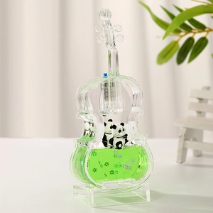 Panda liquid floating toy in violin shape with green fluid and sequins desk decor