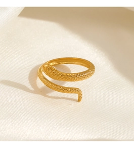 Detailed close-up of 18K gold plated snake ring with intricate scale textures on silk