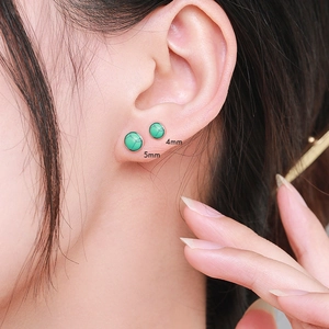 S925 sterling silver turquoise stud earrings in 4mm and 5mm sizes shown on ear