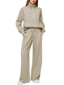 Detail of apricot two-piece loungewear set with half-zip sweatshirt and wide-leg pants