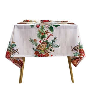 Mantel navideño con campanas festivas y motivos de fiesta sobre fondo blanco decorativo