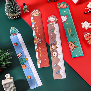 Close-up of 15cm Christmas themed colorful rulers with cartoon patterns and scales