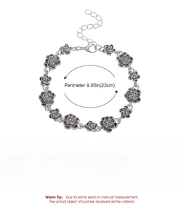 Detail view of vintage rose link bracelet with adjustable chain and lobster clasp