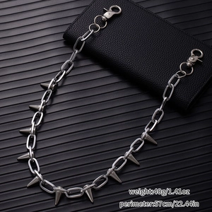 Detail view of silver punk spike pants chain with dual hooks and size specifications