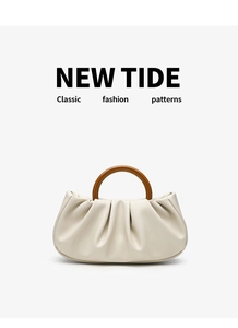 Chic beige ruched cloud handbag featuring a stylish brown resin circular handle