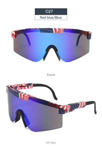 Detail of sports sunglasses with blue mirrored lenses and American flag pattern frame