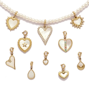Natural shell heart pendant necklace with pearl strand and gold spring clasp charms