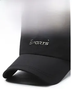 Detailed close-up of quick-dry black sports baseball cap with silver metal logo
