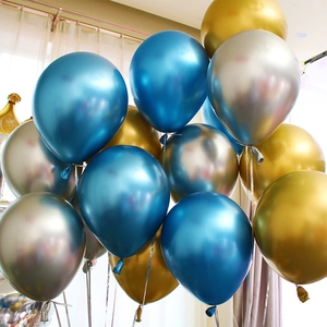 Close-up of metallic blue gold and silver latex balloons for party decoration