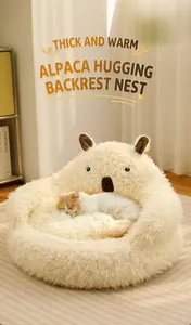 Cosy alpaca shaped cat bed with thick plush lining showing cat sleeping in warmth