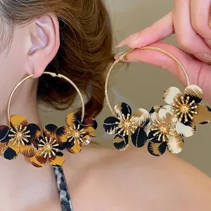 Retro leopard print fabric flower hoop earrings with gold metal accents for women