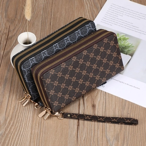 Elegant long double zipper wallet with classic monogram pattern and wrist strap