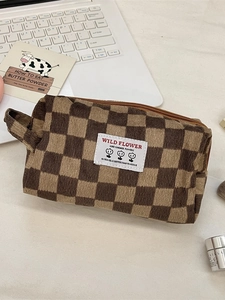 Brown checkered corduroy cosmetic bag with top zipper and side handle for travel storage