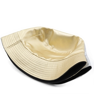 Metallic gold vintage leather bucket hat with black lining for outdoor sun protection