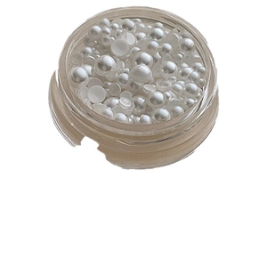 Jar of mixed size white mermaid pearls and glass beads for 3D nail art decoration